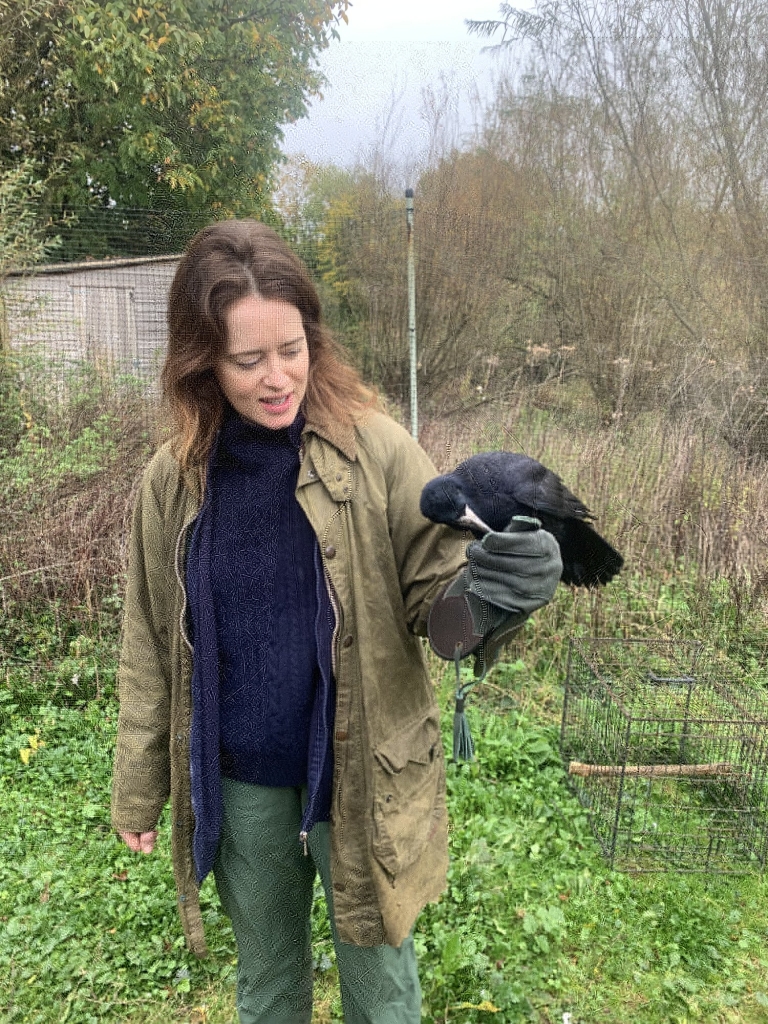 Claire Foy with Onyx the rook on the glove